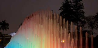 Illuminated fountains in Magical Water Circuit in Reserve Park, Lima, Peru.