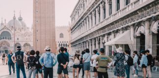 Tourist group on Piazza San Marco in Venice, Italy