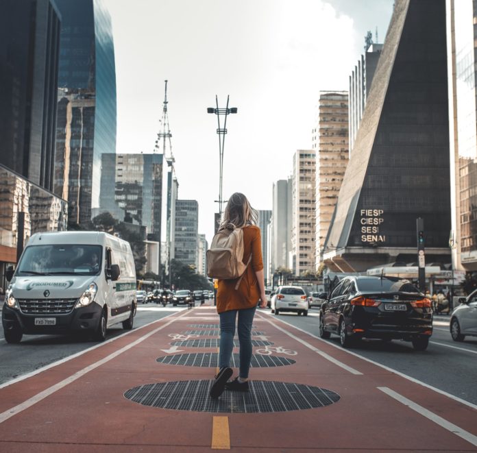 Woman walking in a city