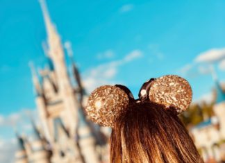 Woman wearing Mickey Mouse ears in Disney