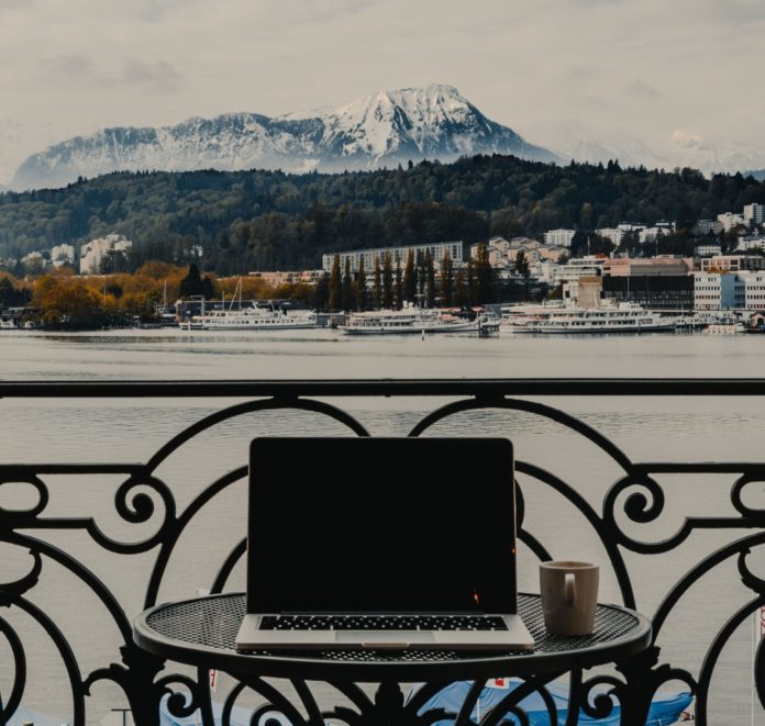 Laptop on table with a view