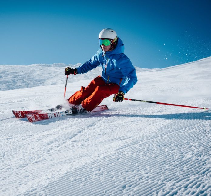 Man skiing on ice hill