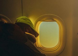 Passenger sleeping on plane
