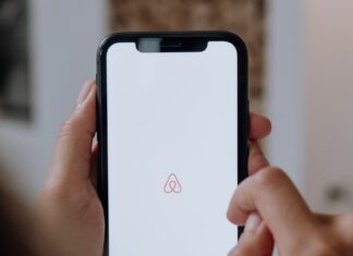 Phone with Airbnb logo